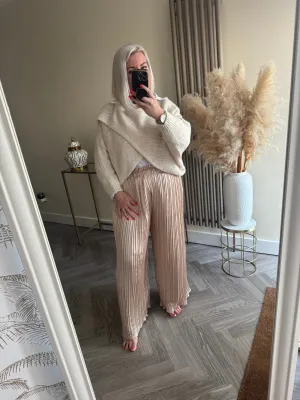 The satin pleated trousers