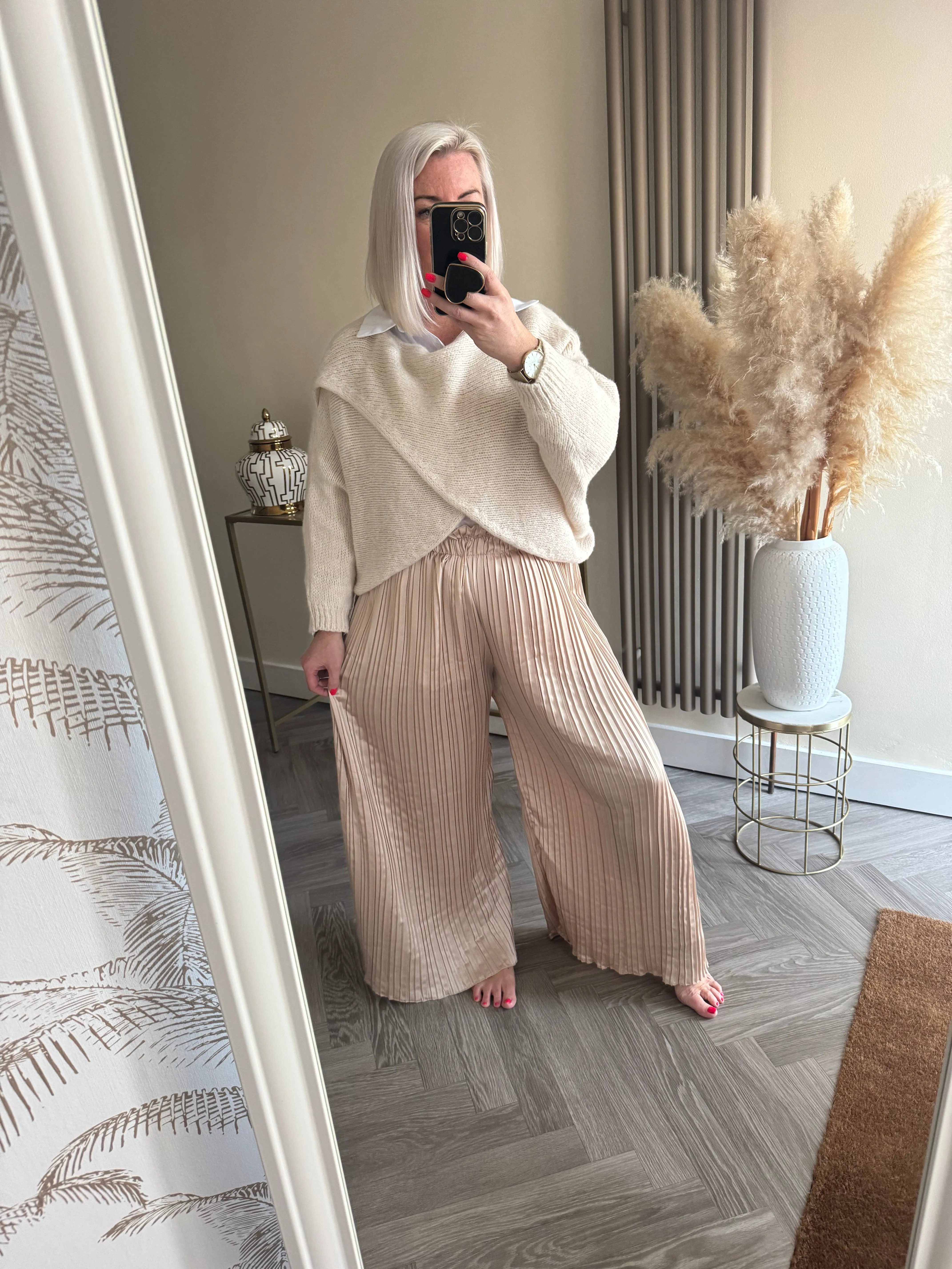 The satin pleated trousers